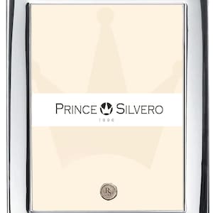 May include: Silver picture frame with a silver crown and the text "PRINCE SILVERO 1996".