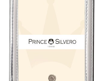 Może przedstawiać: Srebrna ramka do zdjęć z ozdobną ramką i logo Prince Silvero z 1996 roku.