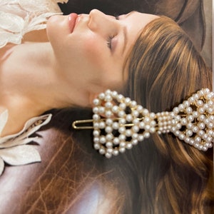Dior Ribbon Bow Hair Clip, Women's Fashion, Watches & Accessories, Hair  Accessories on Carousell