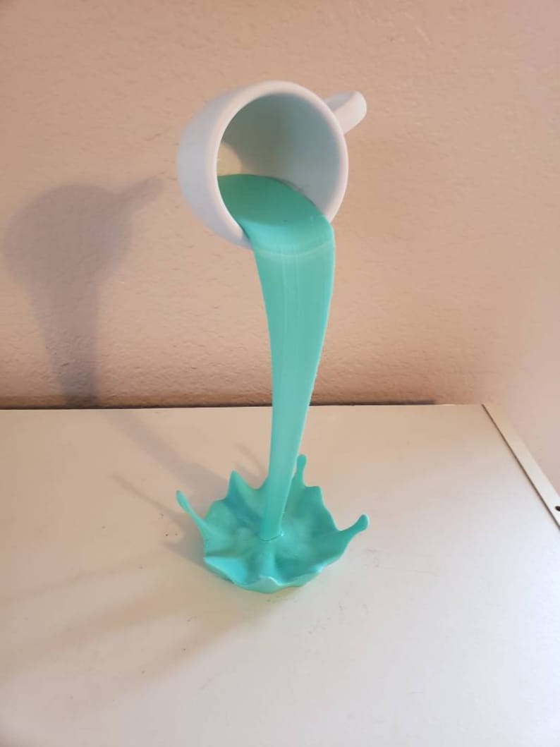 Floating Cup With Spill and Splash Etsy