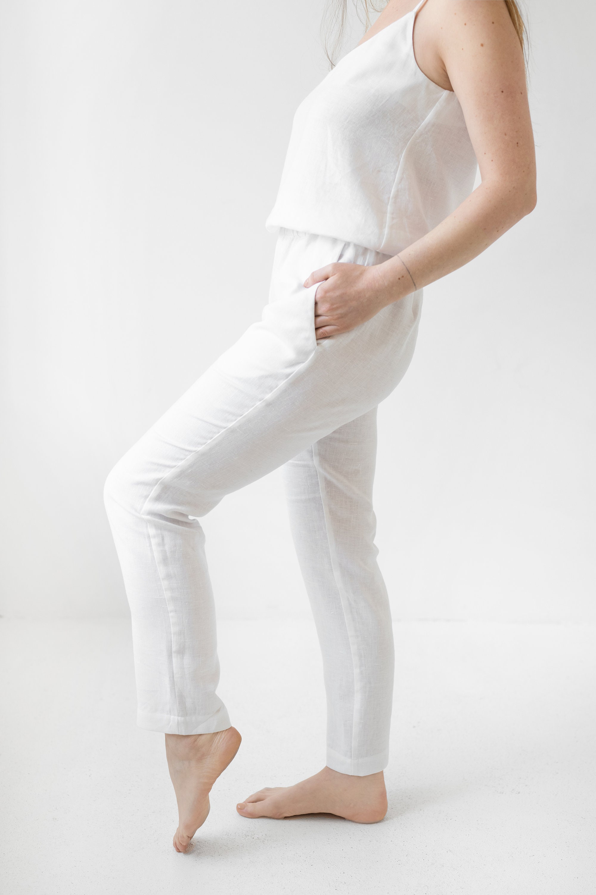tapered white linen trousers
