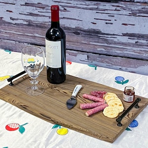 Reclaimed sinker cypress charcuterie board with beautiful handles