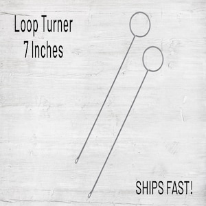 May include: Two silver loop turners, each with a circular loop at the end of a long, thin handle. The turners are 7 inches long.  Loop Turner 7 Inches.