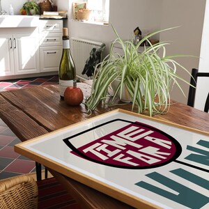 May include: A framed print with a white background and a red wine glass graphic. The text inside the glass reads "Time for a Wine".