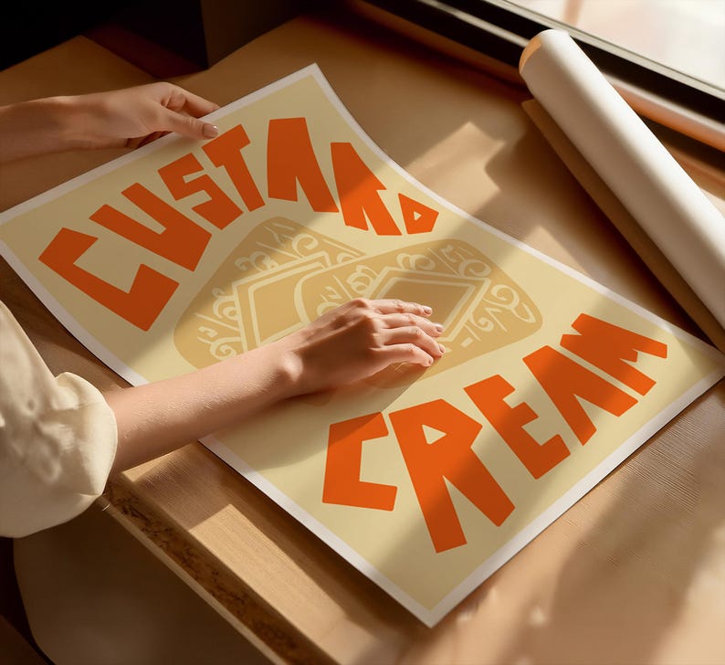 May include: A beige poster with the text "Custom Cream" in orange letters. The poster has a stylized design of a scoop of ice cream with a swirl of cream on top.