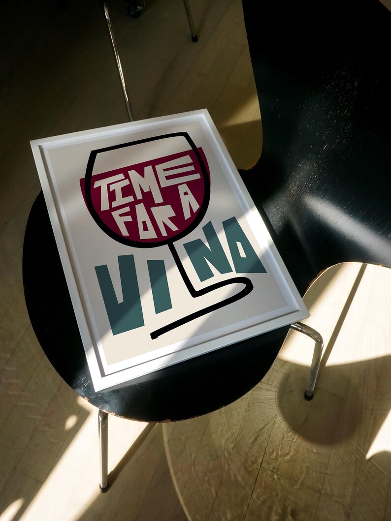 May include: A white framed print with a red wine glass illustration and the text "Time for a Vina" in white and teal lettering.
