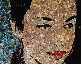 May include: A mosaic portrait of a person's face made from hundreds of small, iridescent, circular pieces of material. The person has dark hair and is looking directly at the viewer. The mosaic is set against a dark background.