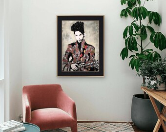 May include: Framed art print featuring a stylized portrait of a musician holding a guitar. The artwork depicts the musician in a patterned jacket with a black background and a gold frame. The print is displayed in a living room setting.