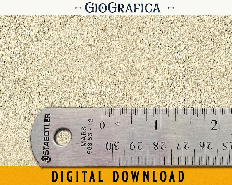 May include: A close-up of a ruler with the brand name "Staedtler Mars" and the model number "963 53-12". The ruler is marked in centimeters and inches.