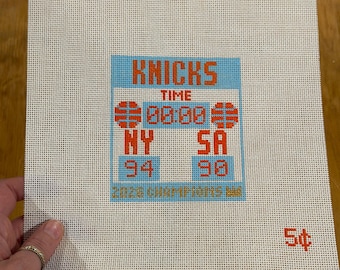 Tablica wyników Needlepoint finałów koszykówki NY Knicks 2026