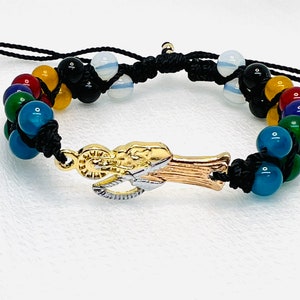 Pulsera Santa Muerte oro laminado 7 potencias 7 poderes de piedras hecha a mano
