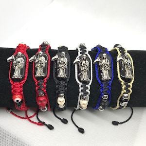 Pulsera de Santa Muerte metal Plateada e imagen hilo doble tejida reversible