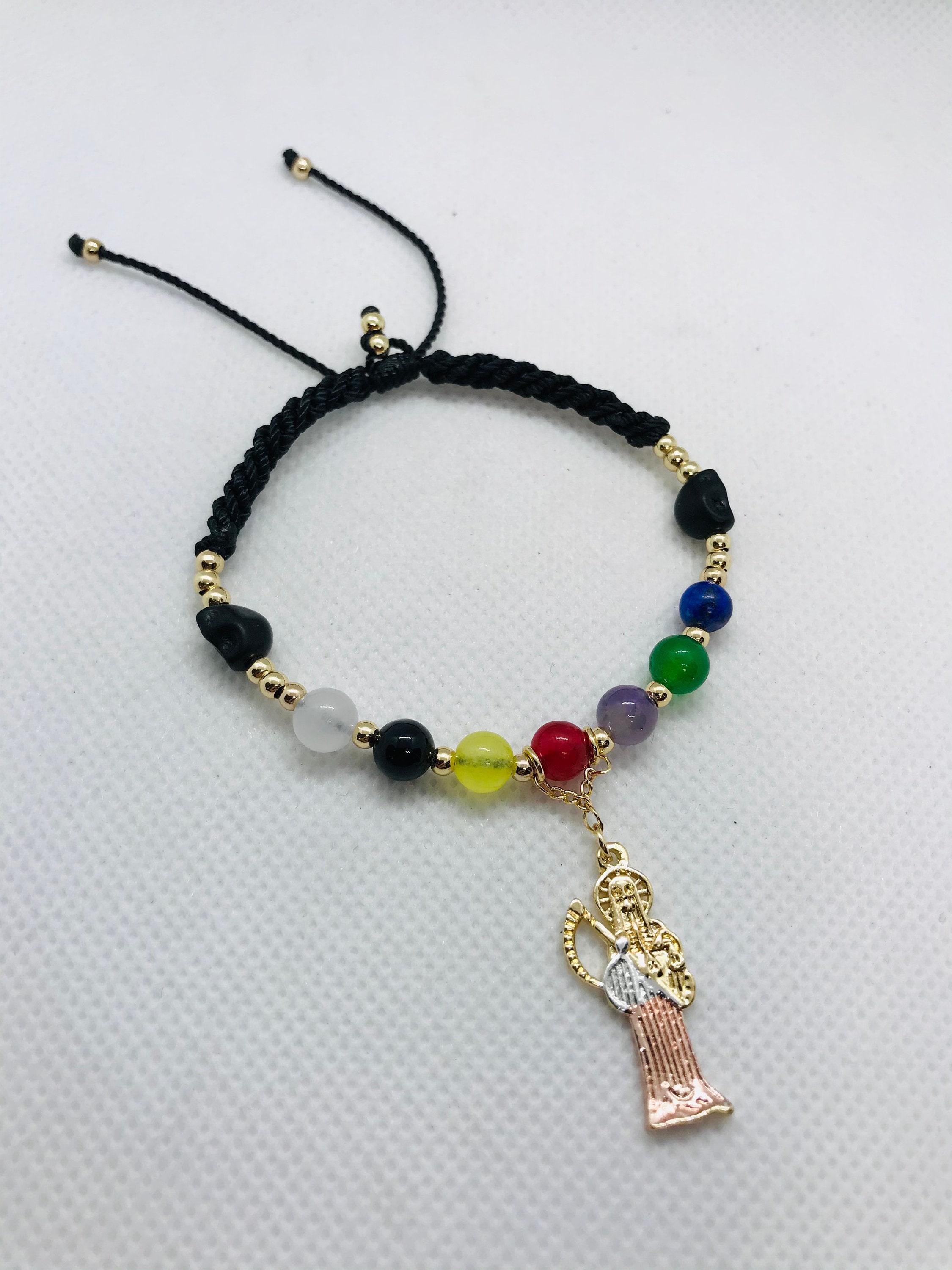 Pulsera torsal de la Santa Muerte oro laminado y piedras 7 - España