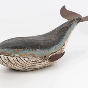 wooden and metal whale