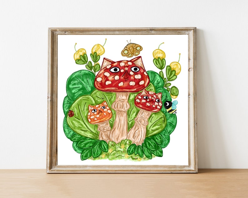 May include: A whimsical illustration of three mushrooms with cat faces. The mushrooms are red with white spots and have green stems. The mushrooms are surrounded by green leaves and yellow flowers. A butterfly and a bee are also in the illustration.