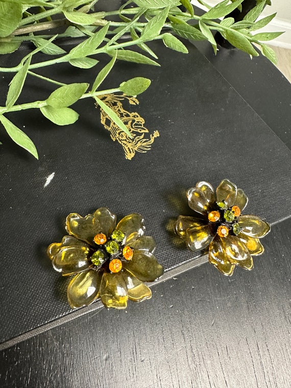 Vintage Bakelite and rhinestone flower clip on ear