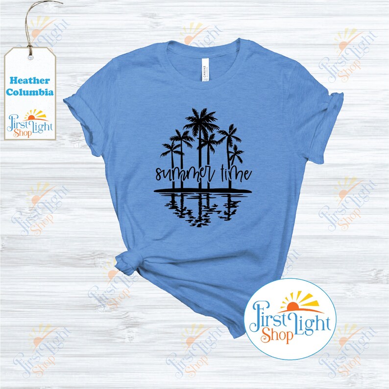 May include: A light blue t-shirt with a black graphic of palm trees and the text "summer time". The palm trees are reflected in the water below.