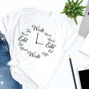 May include: White t-shirt with a clock design featuring the words "Write", "Revise", "Edit", "Panic", "Eat", "Tea", and "Coffee".