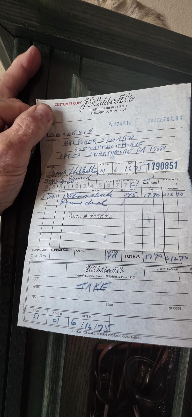 May include: A vintage J.E. Caldwell Co. customer copy receipt, dated June 16, 1975, with handwritten details. The receipt includes the customer's name, address, and a list of purchased items, including an "almozalock". The total amount is $312.70.