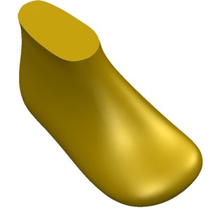 Könnte beinhalten: Eine goldgelbe Schuhform, ein Werkzeug, das von Schuhmachern verwendet wird, um Schuhe zu erstellen und zu formen.