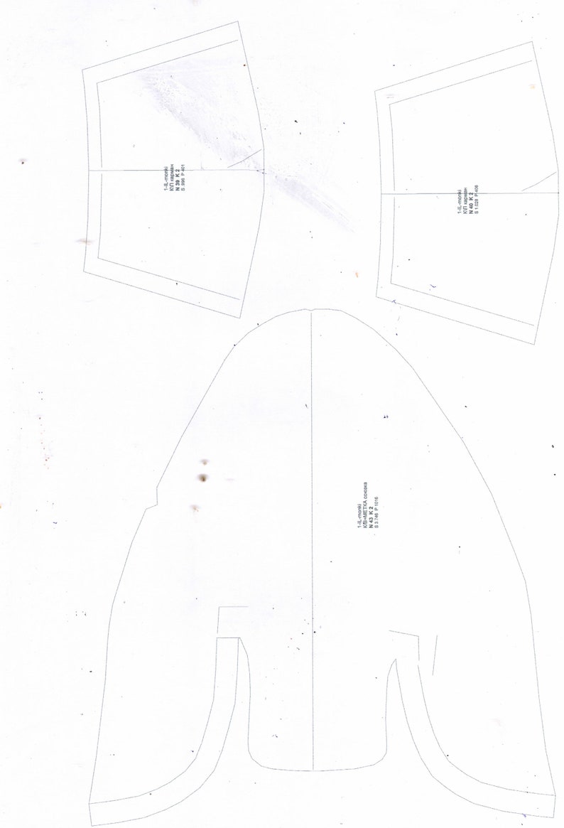 May include: A white paper pattern for a garment with the text "1-6-cool  KOBYETTA  COOPER  N.43.X.2  8.1.18  P.72/26"