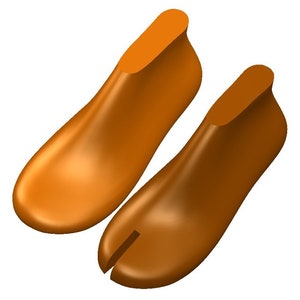 Puede incluir: Dos hormas de zapatos marrones, una con diseño de puntera dividida, se muestran sobre un fondo blanco. Las hormas están hechas de un material liso y sólido en un tono cálido y terroso. El diseño sugiere la construcción de calzado.