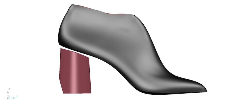 May include: A black ankle boot with a chunky burgundy heel. The boot has a pointed toe and a sleek, modern design.