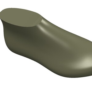 Peut inclure: Une forme de chaussure en bois vert, utilis&eacute;e pour cr&eacute;er la forme d'une chaussure.