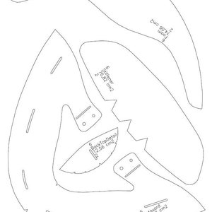May include: A black and white line drawing of a pattern for a hat. The pattern includes measurements in centimeters for the different pieces of the hat.