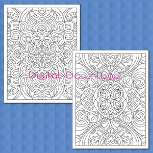 May include: Two black and white printable coloring pages featuring intricate mandala designs. The first page features a circular mandala with a central flower design. The second page features a circular mandala with a central heart design.