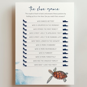 May include: A white card with the text "the shoe game" and questions for a couple to answer. The card features illustrations of high heels and men's shoes, along with a watercolor turtle and blue accents.