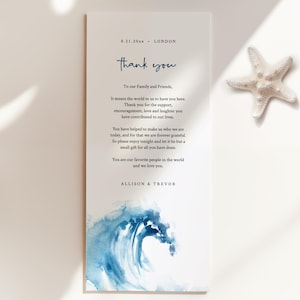 May include: A thank you card with a blue watercolor wave design. The card reads "Thank you" and includes the text "To our Family and Friends, It means the world to us to have you here. Thank you for the support, encouragement, love and laughter you have contributed to our lives. You have helped to make us who we are today, and for that we are forever grateful. So please enjoy tonight and let it be but a small gift for all you have done. You are our favorite people in the world and we love you. ALLISON & TREVOR"