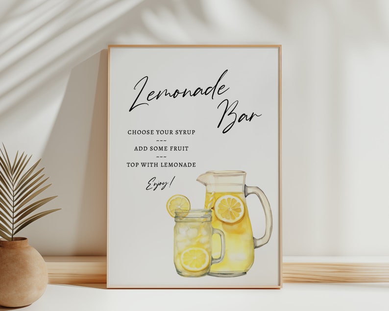May include: A printable sign for a lemonade bar with a watercolor illustration of a pitcher and glass of lemonade. The sign says "Lemonade Bar" and includes instructions: "Choose your syrup, add some fruit, top with lemonade, Enjoy!"