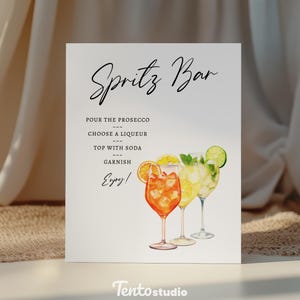 Create a stylish focal point at your bar with the Spritz Bar Sign Template! Featuring editable text, this custom sign is perfect for highlighting your signature cocktails. Ideal for any bar looking to spotlight refreshing and vibrant spritz drinks.