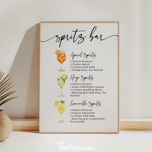 Create a stylish focal point at your bar with the Spritz Bar Sign Template! Featuring editable text, this custom sign is perfect for highlighting your signature cocktails. Ideal for any bar looking to spotlight refreshing and vibrant spritz drinks.