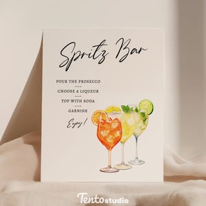 Create a stylish focal point at your bar with the Spritz Bar Sign Template! Featuring editable text, this custom sign is perfect for highlighting your signature cocktails. Ideal for any bar looking to spotlight refreshing and vibrant spritz drinks.
