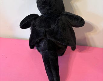 Cow in bat costume