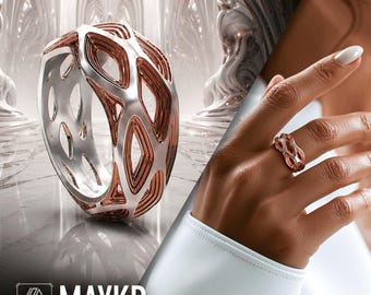May include: A wide band ring featuring a complex, openwork lattice design with a dual-tone finish of polished silver and copper. The ring displays a repeating geometric pattern of interconnected loops and voids. The text MAYKR is visible.