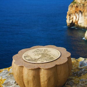 BLUE SOUL biodegradable memorial urn handmade from paper mache, with a round wooden lid and natural handcrafted texture