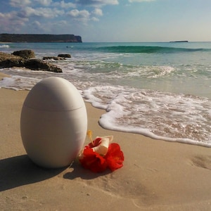 Coco Biological Urn - Ecological and eco-sustainable urns for a burial on land and in the sea or lake. Eco funeral, green funeral, bio urn.