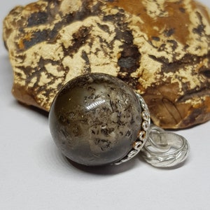 Baltic amber ball, pendant with 925 sterling silver