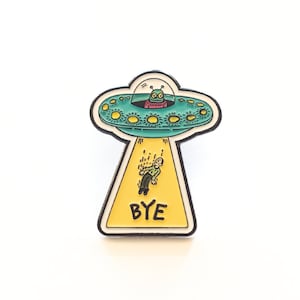 Alien Spaceship Enamel Pin - BYE - Quirky UFO Abduction - Funny Sci-Fi Lapel Badge - Alien Design Accessory.