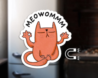 May include: A white magnet with a cartoon orange cat meditating with the text "MEOWOMM" in black lettering.