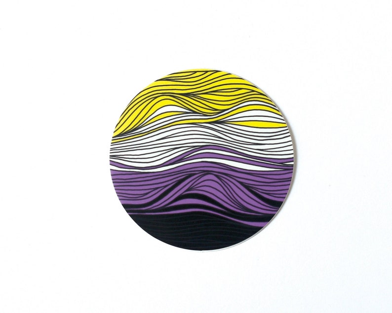 May include: A round sticker with a wavy pattern in yellow, white, purple, and black colors.