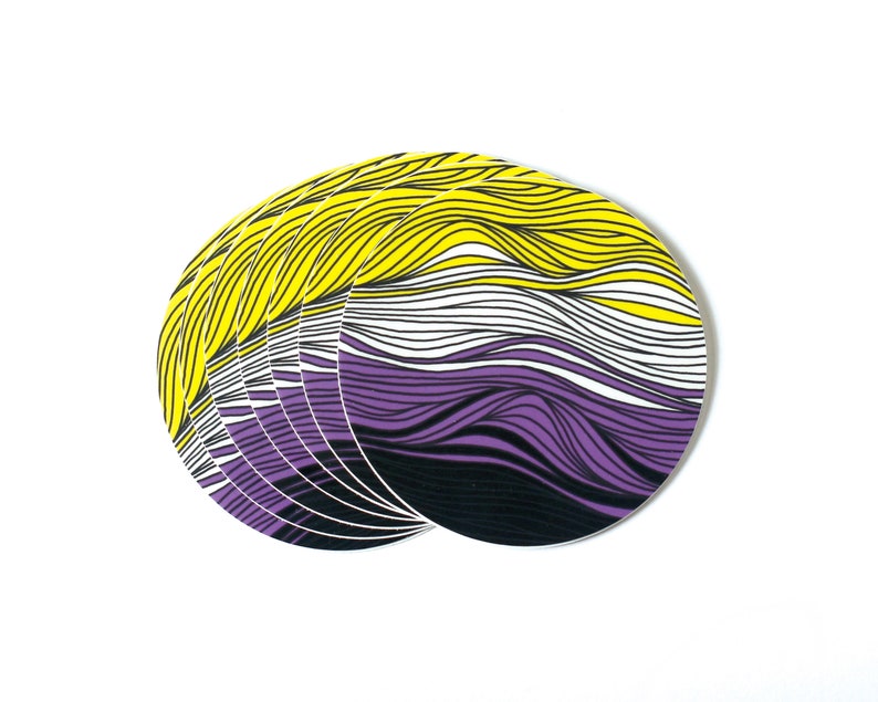May include: A stack of round stickers with a yellow, white, and purple striped design. The stripes are wavy and resemble a flowing pattern.