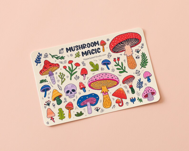 May include: A sticker featuring a colorful illustration of various mushrooms, leaves, and a skull. The text "Mushroom Magic" and the website "RippleSplashStudio.com" are also included.