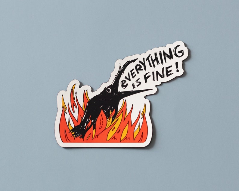May include: A black bird with its beak open, screaming "EVERYTHING IS FINE!" while engulfed in flames. The bird is surrounded by orange and yellow flames.