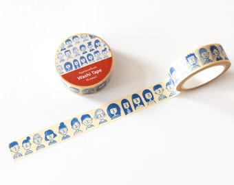 May include: A roll of beige washi tape with a blue and white pattern of faces. The tape is 10 meters long and is labeled "Washi Tape".