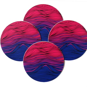 May include: Set of four round coasters with a wavy pattern in shades of pink, purple, and blue.