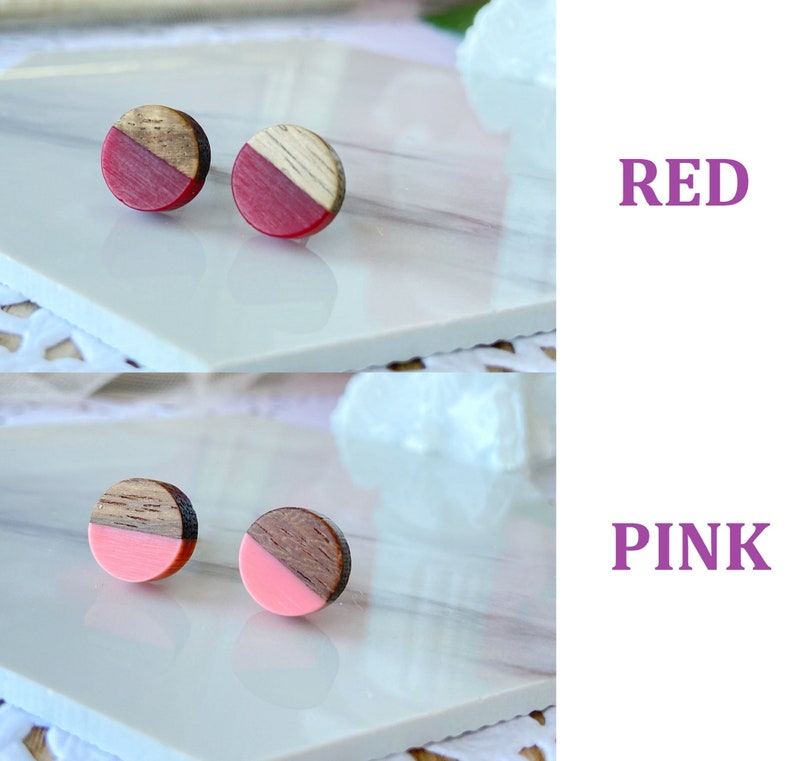 May include: Two pairs of round wooden stud earrings. One pair features a red and wood grain design, the other pair has a pink and wood grain design. The word "RED" and "PINK" are displayed in purple text.